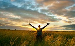 sun beind the man